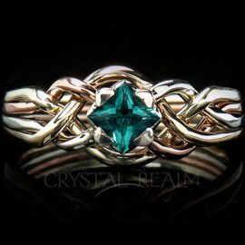 4 piece puzzle ring with princess cut lab created emerald and four colors of 14k gold