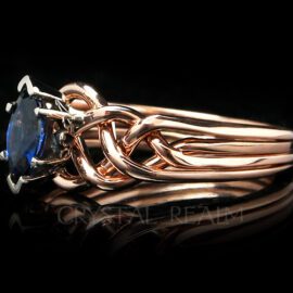 Marquise sapphire puzzle ring with four bands of 14k rose gold