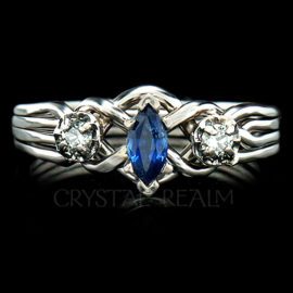 4 piece puzzle engagement ring with marquise sapphire and two round diamonds