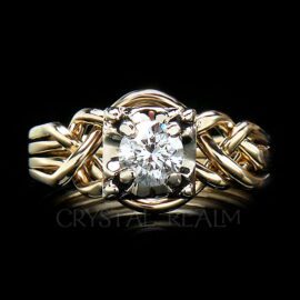 four band puzzle ring with round diamond and bands of 14k yellow gold with 14k white gold illusion setting
